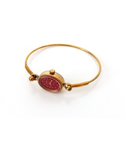 Small watch with red dial