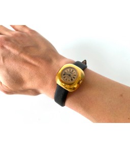 Gold watch with black...